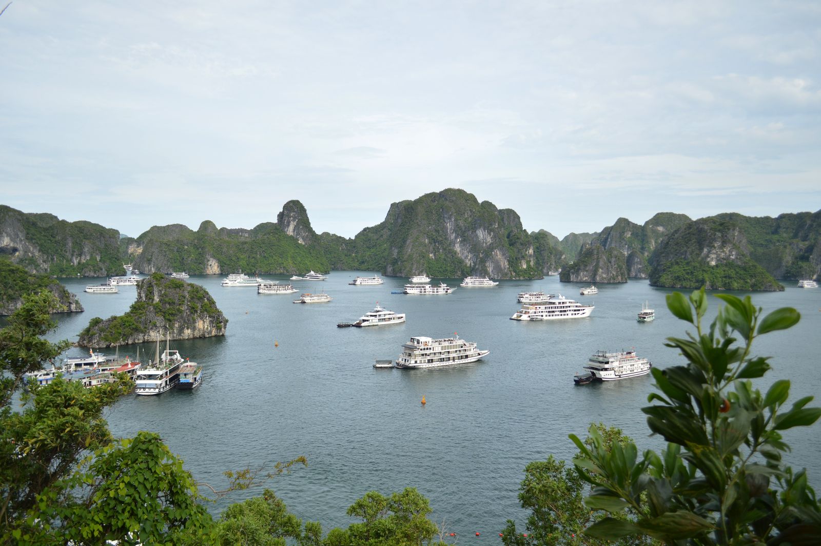 Cruise boats among the limestone karsts of Halong Bay